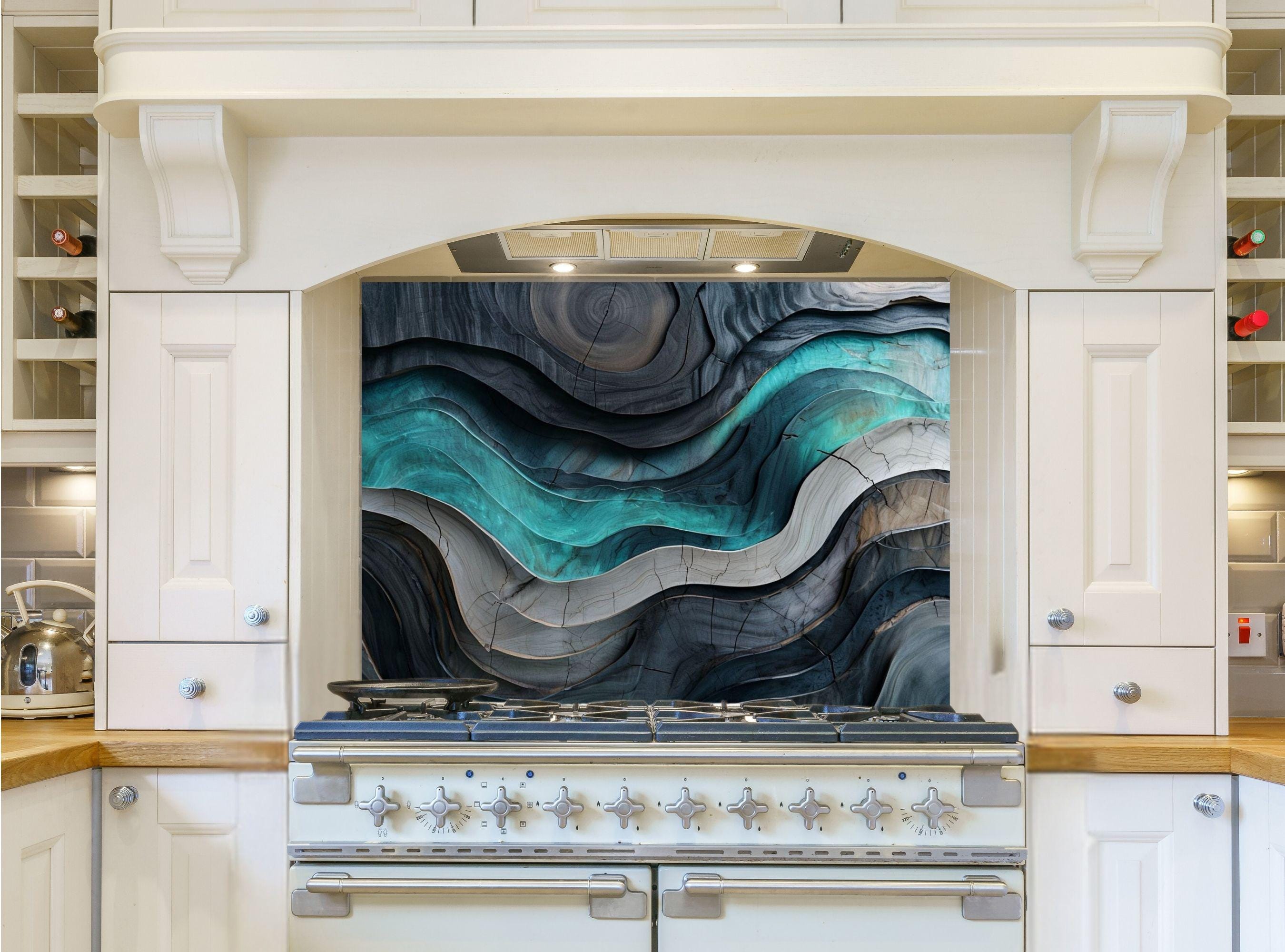 May include: A white kitchen range with a black and teal abstract design backsplash. The backsplash features a wavy pattern with a 3D effect. The range has a black top with six silver knobs and a white oven door.