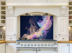 May include: A kitchen with a white range hood and white cabinets. The backsplash behind the stove is a dark blue with a colorful abstract design of pink, blue, and yellow swirls.