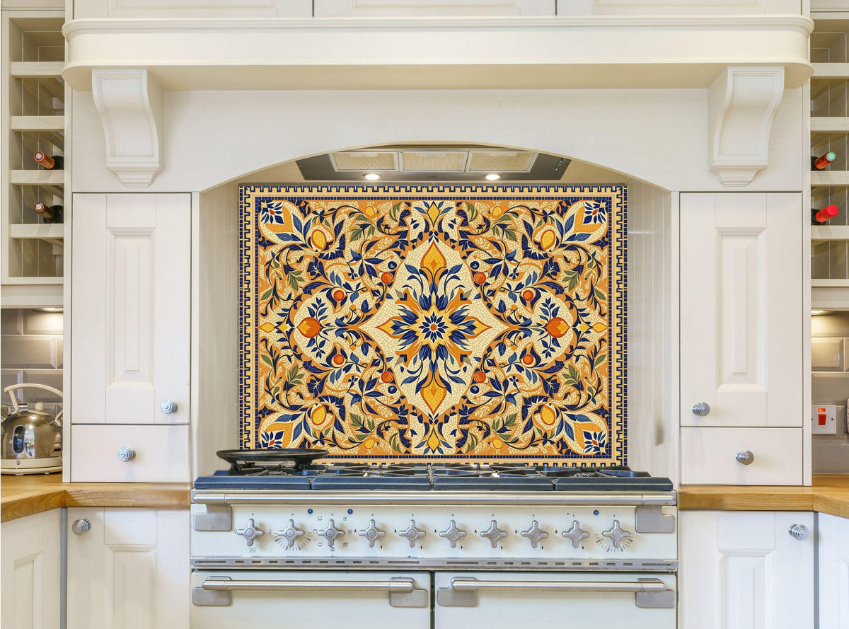 May include: A white kitchen with a stainless steel range hood and a stovetop. The range hood has a decorative tile backsplash with a floral pattern in shades of blue, yellow, and orange.