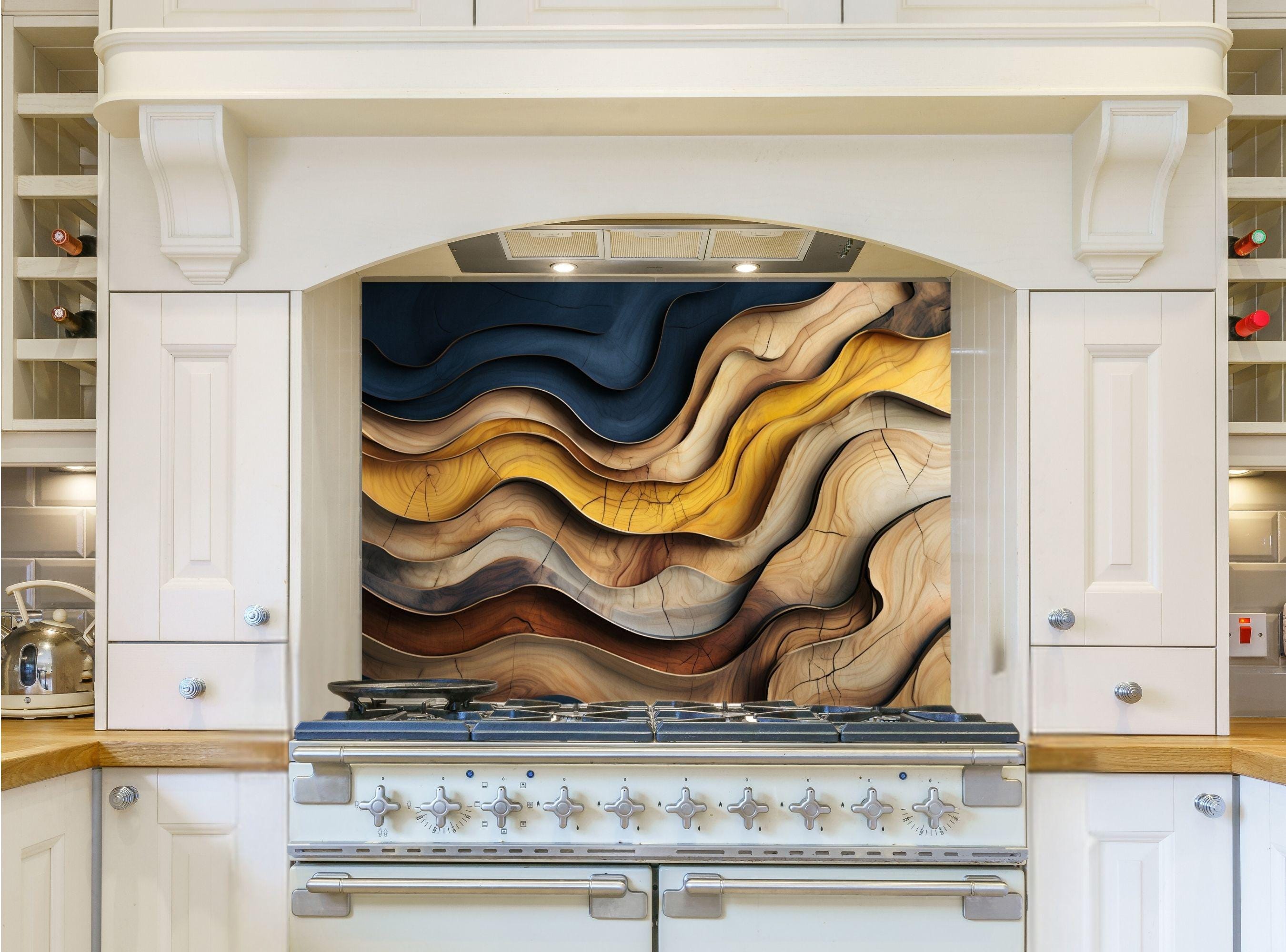 May include: A white kitchen with a stove and a backsplash featuring a colorful abstract design of wavy lines in shades of brown, yellow, and blue.