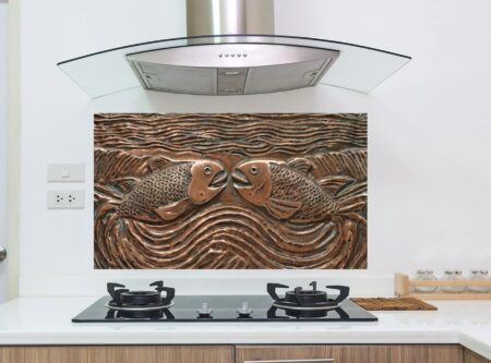 Intricately Carved Copper Relief Panel Featuring Symmetrical Fish